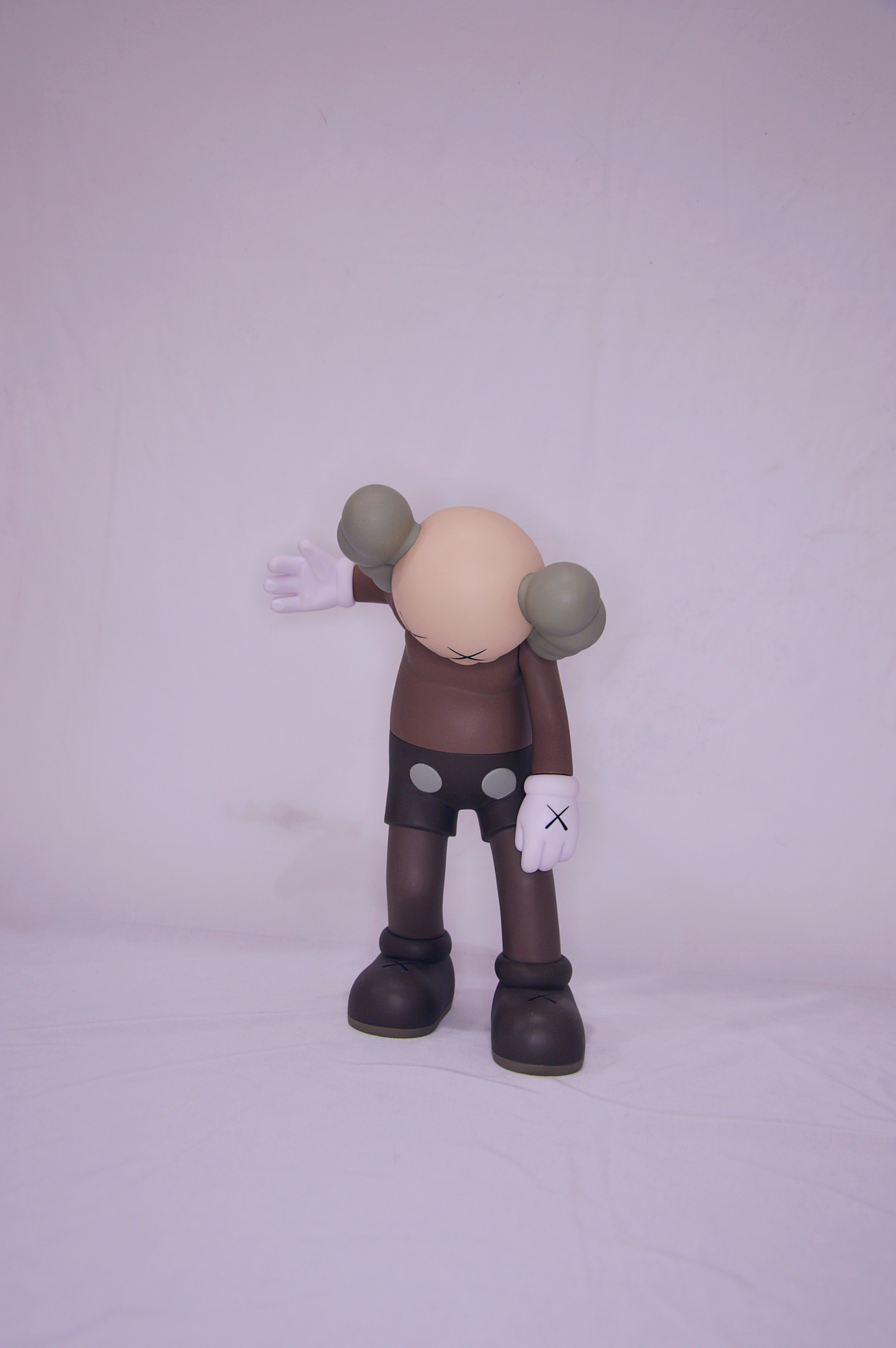 Kaws, Along the way – brown figure