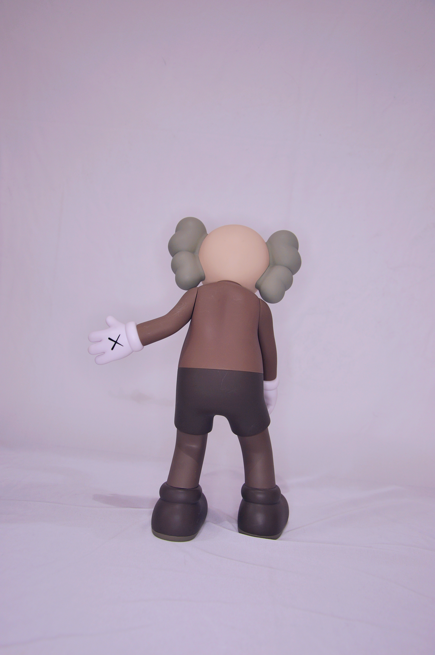 Kaws, Along the way – brown figure